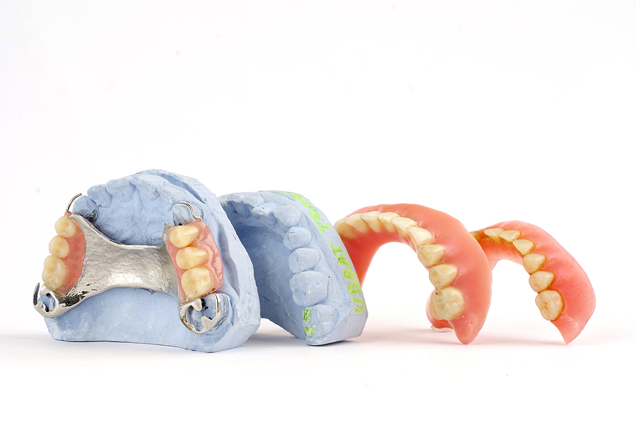 Restoring Smiles with Dentures & Partials: Your Comprehensive Guide